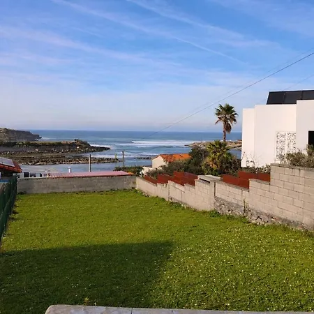 En La Playa Con Vistas Al Mar Y Jardin